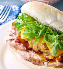 Smokey, grilled fresh ham on a bun with caramelized onions & apples... the best ever sandwich