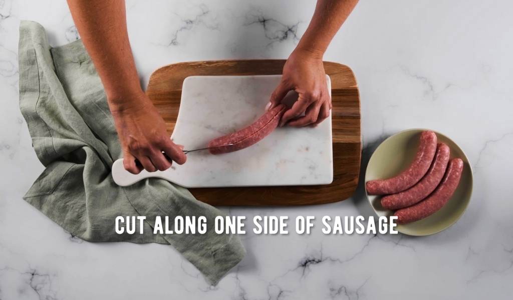 Step 1 to removing sausage casings - cut along one side