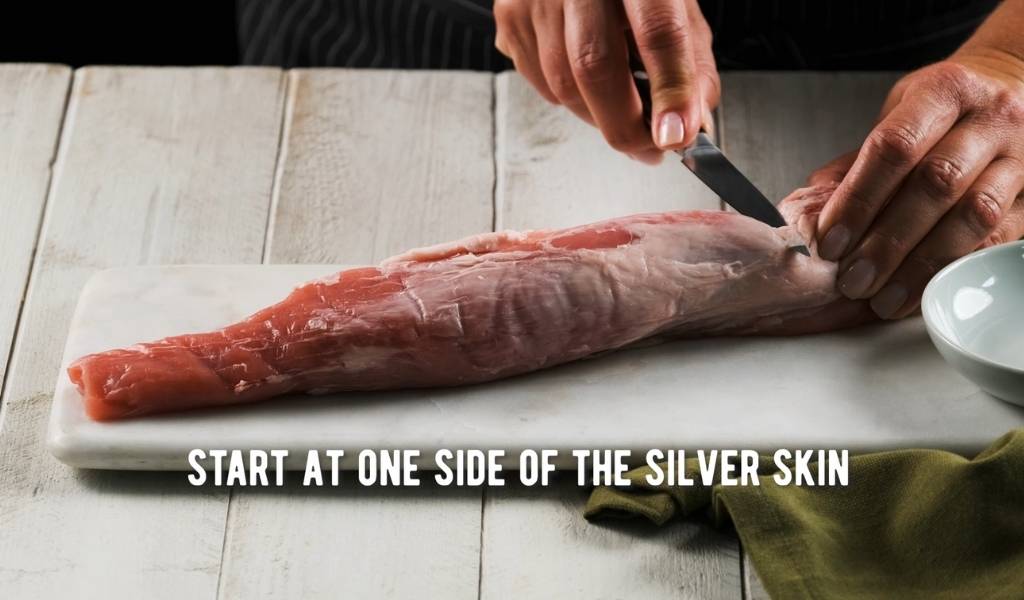 Step 1 to removing silver skin from pork tenderloin - Locate silver skin